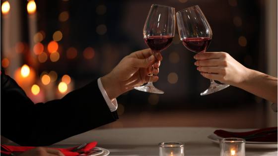 A couple toasting with wine